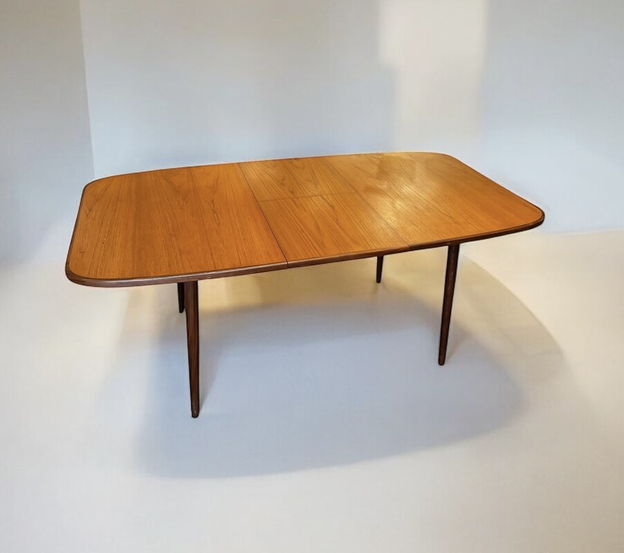 F 424 APO extendable teak dining table 