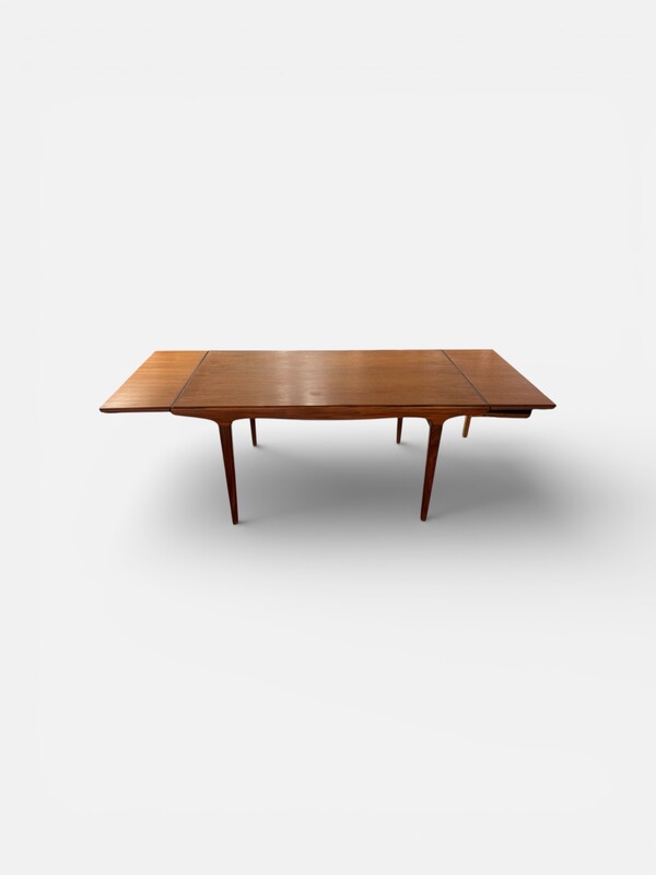 F 438 AG Dining table teak with 2 extensions by KNUD NIELSEN