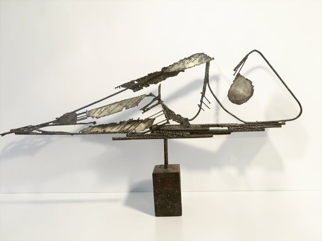 M 559 FL brutalist metal sculpture on blue stone socle 