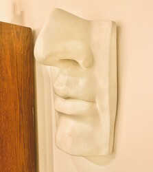 M 788 AV wall face sculpture, plaster 
