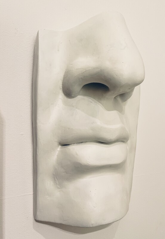 M 788 AV wall face sculpture, plaster 