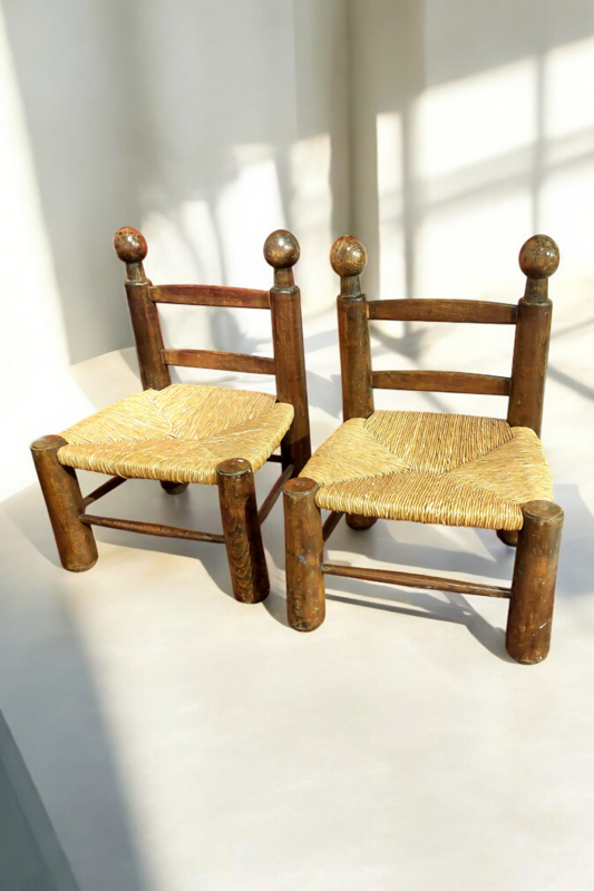 S 271 JC Pair of straw fireside chairs by Charles Dudouyt