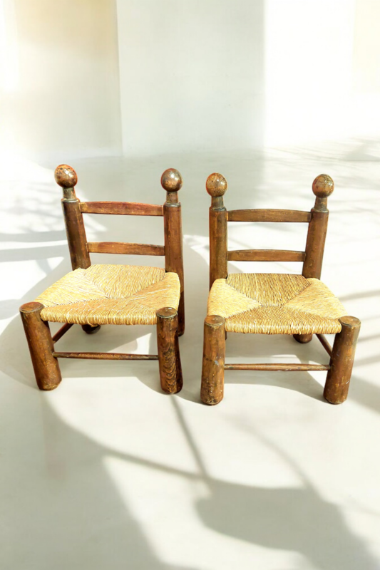 S 271 JC Pair of straw fireside chairs by Charles Dudouyt