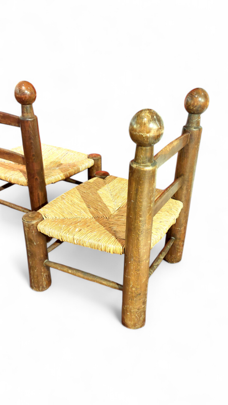 S 271 JC Pair of straw fireside chairs by Charles Dudouyt