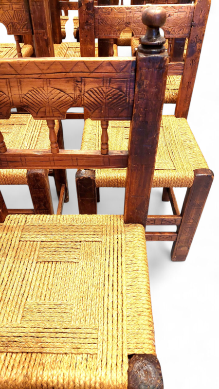 S 371 JC A rare set of 12 chairs in Swiss pine and walnut with fan-shaped decoration, origin: Queyras, France, 19th or late 18th century